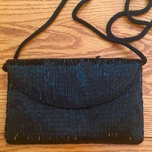 Beautiful sequined black evening bag